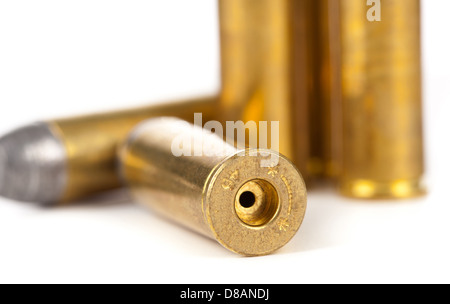 Heap of bullets on white background Stock Photo