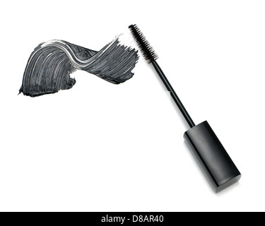 mascara wand with sweep of mascara cut out onto a white background Stock Photo