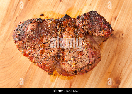 Juicy Organic Grilled Steak ready for dinner Stock Photo