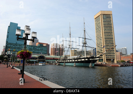 View of Baltimore Harbor with USS Constellation Ship and office buildings Stock Photo