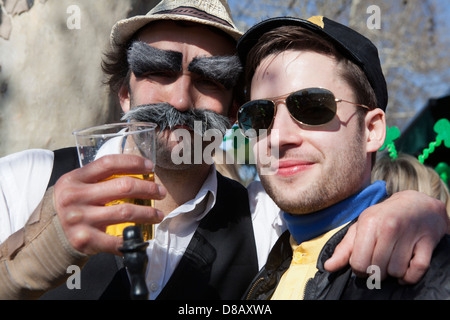 Two Irish rugby fans dressed as Super Mario Bros and Frankie Dettori at the six nations Italy vs Ireland match in Rome, 16th Mar Stock Photo