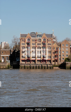 View of Oliver's Wharf, Wapping High Street, on the River Thames from Rotherhithe, London, SE16, UK. Stock Photo