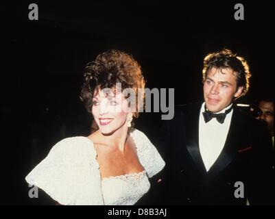 JON-ERIK HEXUM, JOAN COLLINS, MAKING OF A MALE MODEL, 1983 Stock Photo