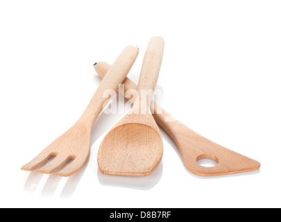 Wooden kitchen utensils isolated on neutral background Stock Photo