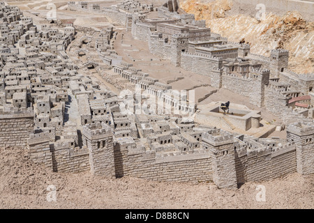 Jerusalem, Israel. A crow drinks water from a puddle inside a model of Jerusalem during the second temple period. Stock Photo