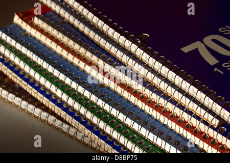 A stack of spiral notebooks, neatly arranged, showcasing their design and structure. The image emphasizes the practical and versatile use of notebooks in various settings. Stock Photo