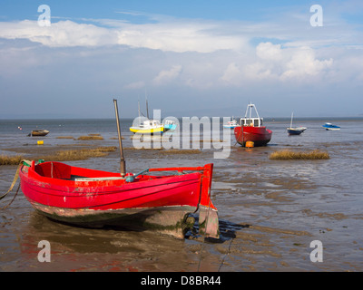 England, Lancashire, Morecambe. Fishing boats at low tide moored at Morecambe / Morecambe Bay. Stock Photo