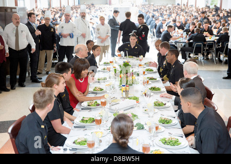 US First Lady Michelle Obama has lunch with midshipmen in King Hall at the US Naval Academy April 17, 2013 in Annapolis, MD. Stock Photo