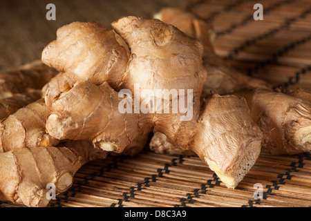 Fresh Organic Oriental Ginger on a background Stock Photo