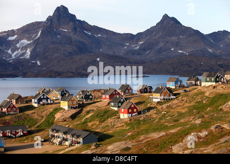 Landscape view of the town of Tasiilaq with mountains in the background, Greenland Stock Photo