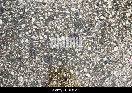 texture of wet concrete road with bubbles on the water closeup Stock Photo