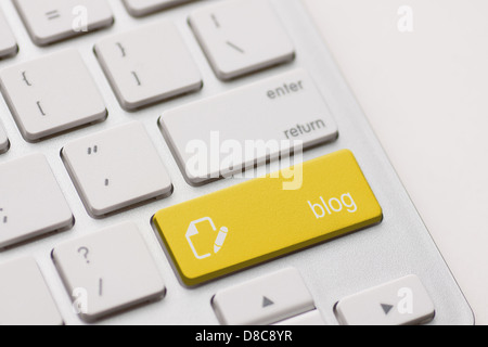 blog enter button key on white keyboard Stock Photo