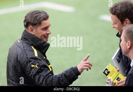 Dortmund's sports manager Michael Zorc gestures during the team's training session held at Wembley stadium in London, England, 24 May 2013. Borussia Dortmund will face Bayern Munich in the UEFA Champions League soccer final in London on 25 May 2013. Photo: Andreas Gebert/dpa +++(c) dpa - Bildfunk+++ Stock Photo
