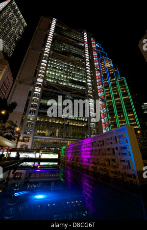 HSBC Hong Kong Headquarters and Standard Chartered building at night in Central, Hong Kong Stock Photo