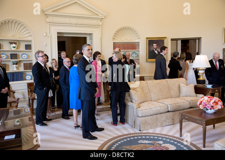 US President Barack Obama pauses in a replica of the Oval Office during a tour of the George W. Bush Presidential Library and Museum on the campus of Southern Methodist University April 25, 2013 in Dallas, Texas. Stock Photo