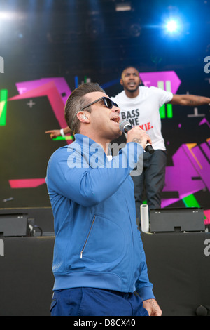 International singing sensation Robbie Williams joined rap star Dizzy Rascal on stage at the Radio1's One Big Weekend in Derry, Londonderry. Stock Photo