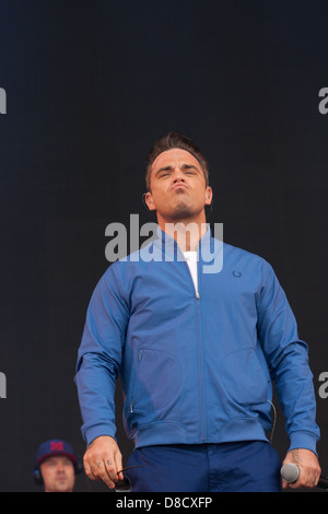 International singing sensation Robbie Williams joined rap star Dizzee Rascal on stage at the Radio1's One Big Weekend in Derry, Londonderry. Stock Photo