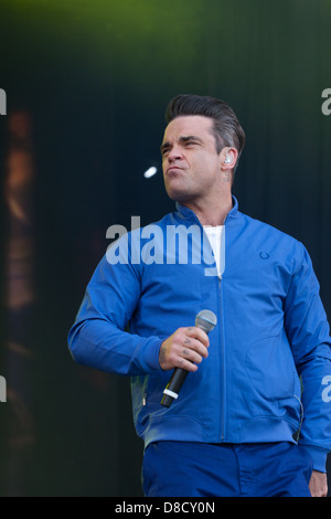 International singing sensation Robbie Williams joined rap star Dizzee Rascal on stage at the Radio1's One Big Weekend in Derry, Londonderry. Stock Photo