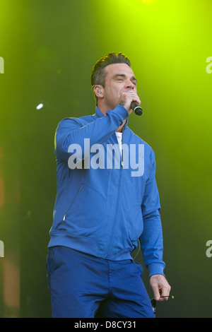 International singing sensation Robbie Williams joined rap star Dizzee Rascal on stage at the Radio1's One Big Weekend in Derry, Londonderry. Stock Photo