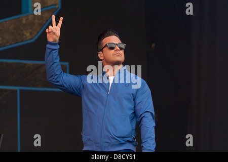 International singing sensation Robbie Williams joined rap star Dizzee Rascal on stage at the Radio1's One Big Weekend in Derry, Londonderry. Stock Photo