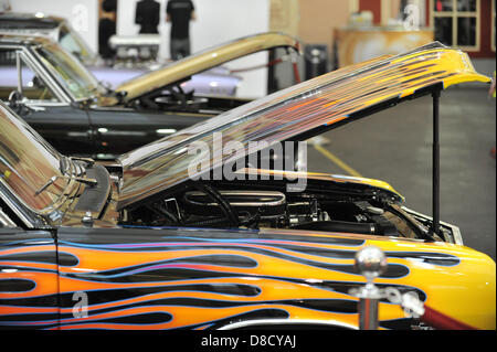 Alexandra Palace, London, UK. 25th May 2013. Classic cars at the Great British Tattoo Show. The Great British Tattoo Show 2013 at Alexandra Palace, with tattooists, alternative fashion shows, Roller Rumble, Body Painting and Burlesque Shows. Credit: Matthew Chattle/Alamy Live News Stock Photo