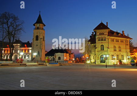 City square in Piatra Neamt: Royal Court with Stephen the Great Church and Tower Stock Photo