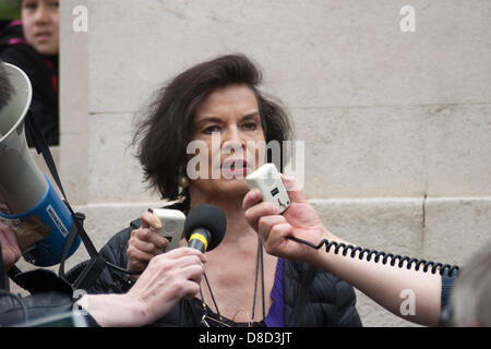 2013-05-25 Westminster, London. Bianca Jagger addresses the crowd gathered outside Parliament to protest against genetically modified foodstuffs and crop seed giant Monsanto Stock Photo