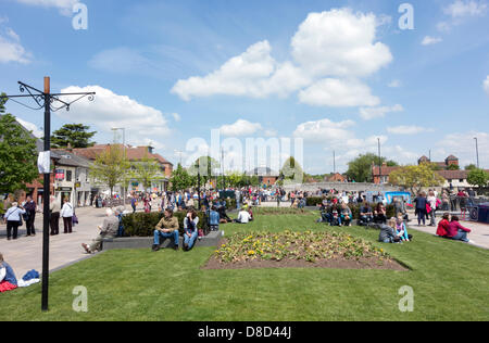 Stratford upon Avon, UK. 25th May 2013. Lots of tourists enjoying the warm and sunny weather in Stratford upon Avon. People sitting on the grass in the canal basin. Credit: itdarbs/Alamy Live News Stock Photo