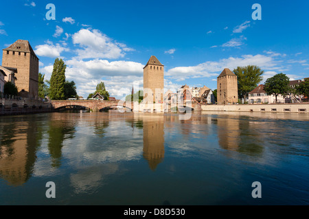 View from tourist boat on Ill river of the Ponts-Couverts / Covered Bridges, Petite France district, Strasbourg, Alsace, France Stock Photo