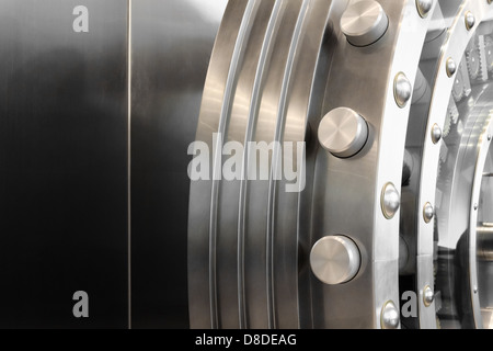 An open safe door in a vault Stock Photo