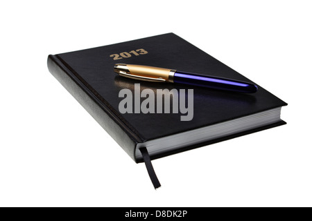 Agenda calendar, notes and a pen Stock Photo