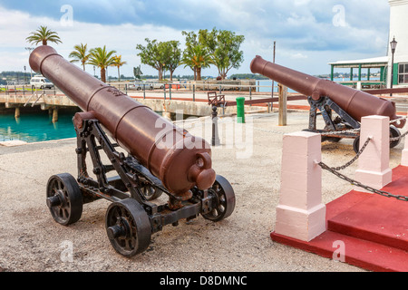 Very old canons sitting on the main square of St. George's, Bermuda Stock Photo