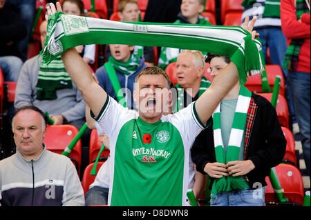 Glasgow, Scotland, UK. Sunday 26th May 2013. A Hibs fan tries to encourage his team during the Hibs v Celtic William Hill Scottish Cup Final at Hampden Park Stadium. Credit: Colin Lunn / Alamy Live News Stock Photo