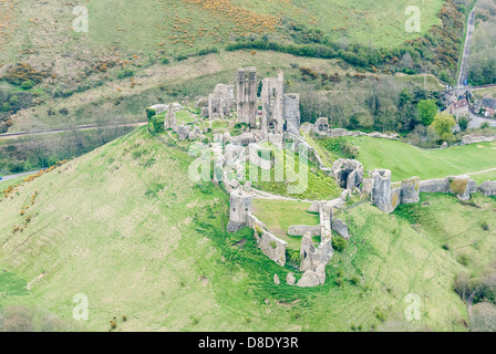 Aerial View Corfe Castle.Corfe Castle is a village and civil parish in the English county of Dorset. It is the site of a ruined castle of the same name Stock Photo