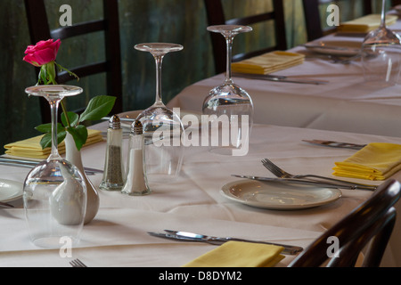 A line of newly made restaurant tables Stock Photo