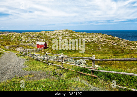 Red Shack and Fence in Cape Bonavista, Newfoundland Stock Photo
