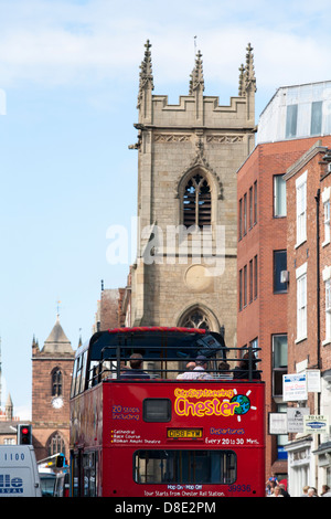 A sightseeing bus takes a tour around Chester, the ancient Roman city in Cheshire Stock Photo