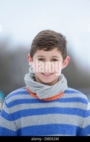 Smiling boy outdoors, portrait Stock Photo