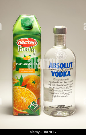 Cacak, Serbia - May 20, 2013: Orange Juice and Absolut Vodka, studio isolated. Stock Photo