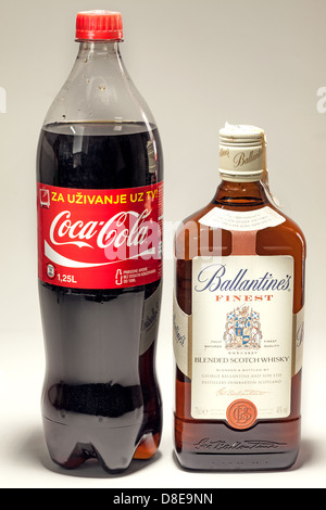 Cacak, Serbia - May 20, 2013: Coca Cola and Ballantine's Whiskey, studio isolated. Stock Photo