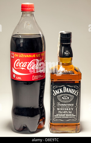 Cacak, Serbia - May 20, 2013: Coca Cola and Jack Daniel's Whiskey, studio isolated. Stock Photo