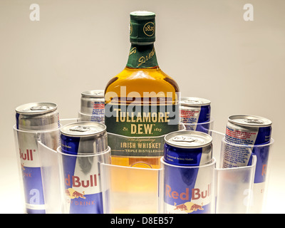 Cacak, Serbia - May 20, 2013: Six Red Bull Cans and Tullamore Whiskey, studio isolated. Stock Photo