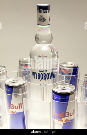 Cacak, Serbia - May 20, 2013: Six Red Bull Cans and Wyborowa Wodka, studio isolated. Stock Photo