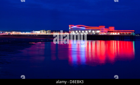 Long exposure of Grand Pier in Bristol Channel at Sunset, Weston Super Mare WSM, Somerset UK Stock Photo