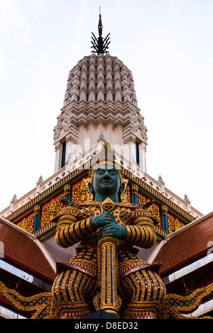 Giant guardian statue at the Temple of Wat Phasrisanpet, Ayuttaya, Thailand with white background Stock Photo