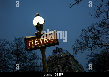 Snow covered Dervaux, Art Déco Paris Metro sign outside Metro Station, Paris. Stock Photo