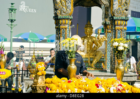 Statue of Phra Phrom, the Thai representation of the Hindu creation god Brahma, Erawan shrine,Bangkok Stock Photo