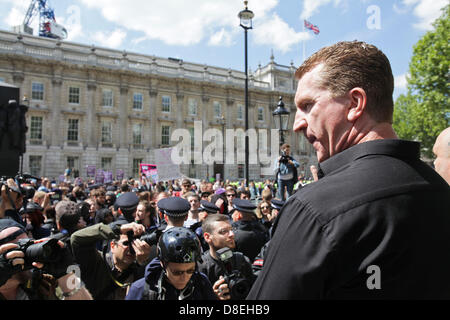 London, UK. 27 May 2013.  Kevin Carrol, a senior figure in the English Defence League, argues with hundreds of Unite Against Fascism protesters. The English Defence League held a demonstration following the murder of Drummer Lee Rigby in Woolwich. Credit:Rob Pinney /Alamy Live News Stock Photo