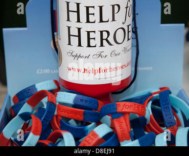 Turton, Lancashire, UK 27th May 2013.  Help for Hero's stall, wristbands and collection jar,  at the annual traditional spring fair held in the grounds of the 600-year-old Turton Tower.  The event dates back more than 200 years, but went into decline in the early 20th century. It was revived in 2008 by the Friends of Turton Tower. Stock Photo