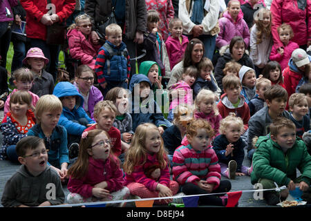 Turton, Lancashire, UK 27th May 2013.  Children watching Punch & Judy at the annual traditional spring fair held in the grounds of the 600-year-old Turton Tower.  The event dates back more than 200 years, but went into decline in the early 20th century. It was revived in 2008 by the Friends of Turton Tower. Stock Photo